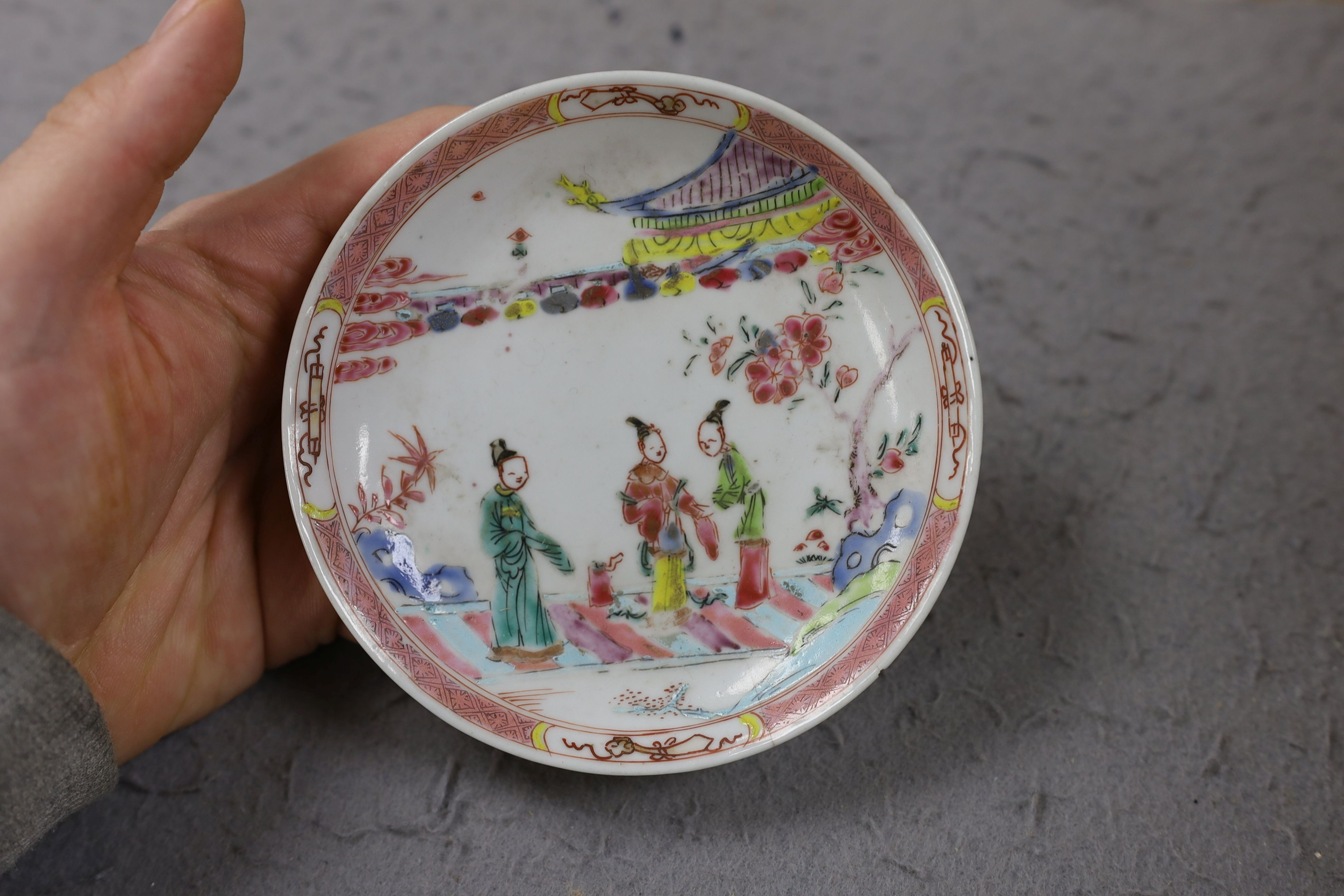 A group of four 18th century Chinese export famille rose saucers